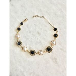 Dark blue sapphire rhinestone with gold chain-link with pearl regal style bracel